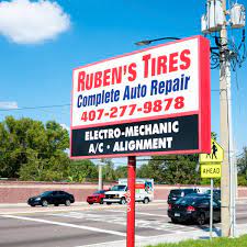 Exterior view of Ruben’s Tires, one of the trusted automotive shops near South Semoran, Orlando, offering full-service car repairs and tire sales with friendly local staff.